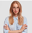 Eunoiax Psicología - Inicio - serious lovely woman student spectacles keeps hands folded listenes attentively professor s lecture wears elegant shirt